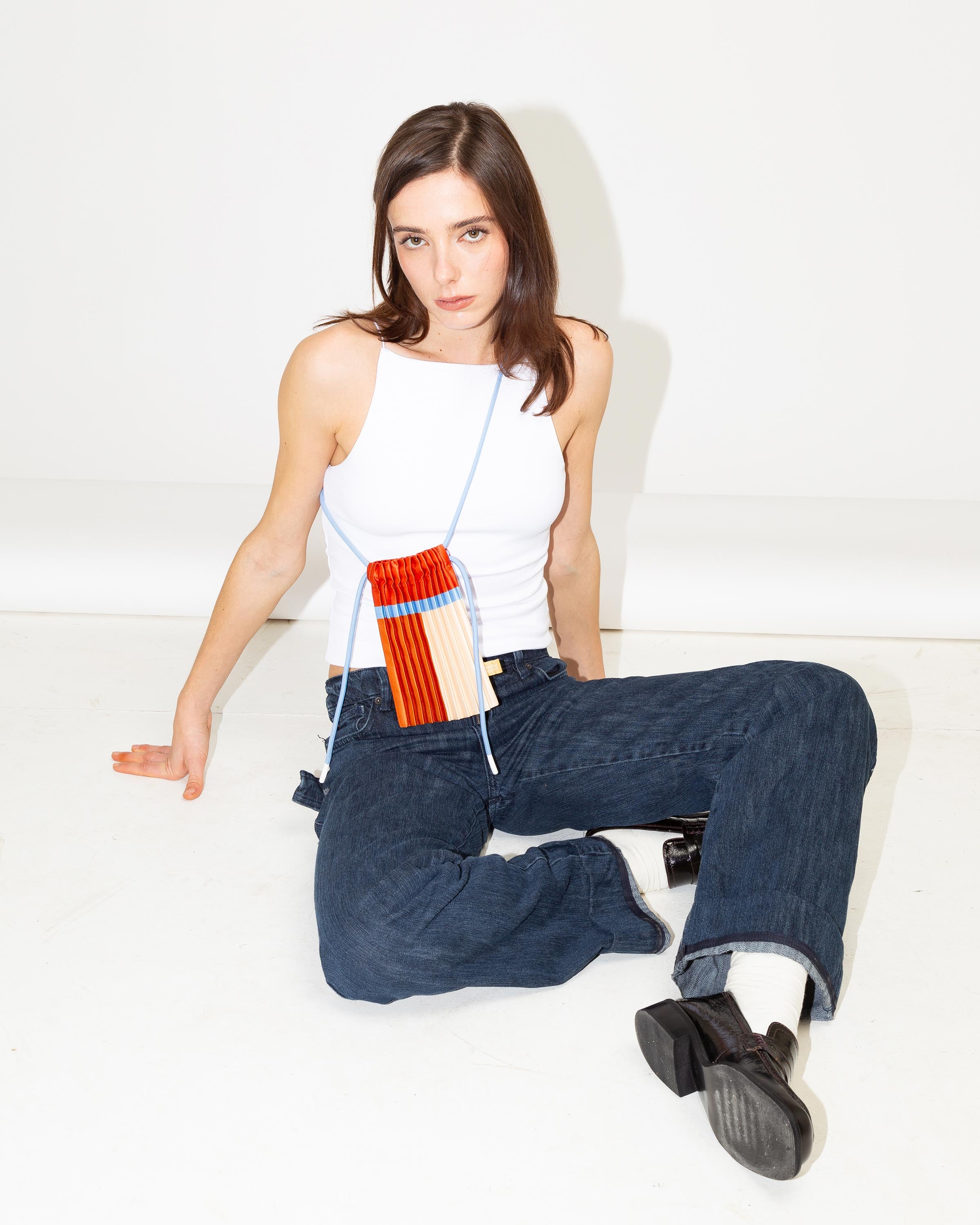 Sienna mini bag a tracolla Multitudes. Colore beige e arancione. 