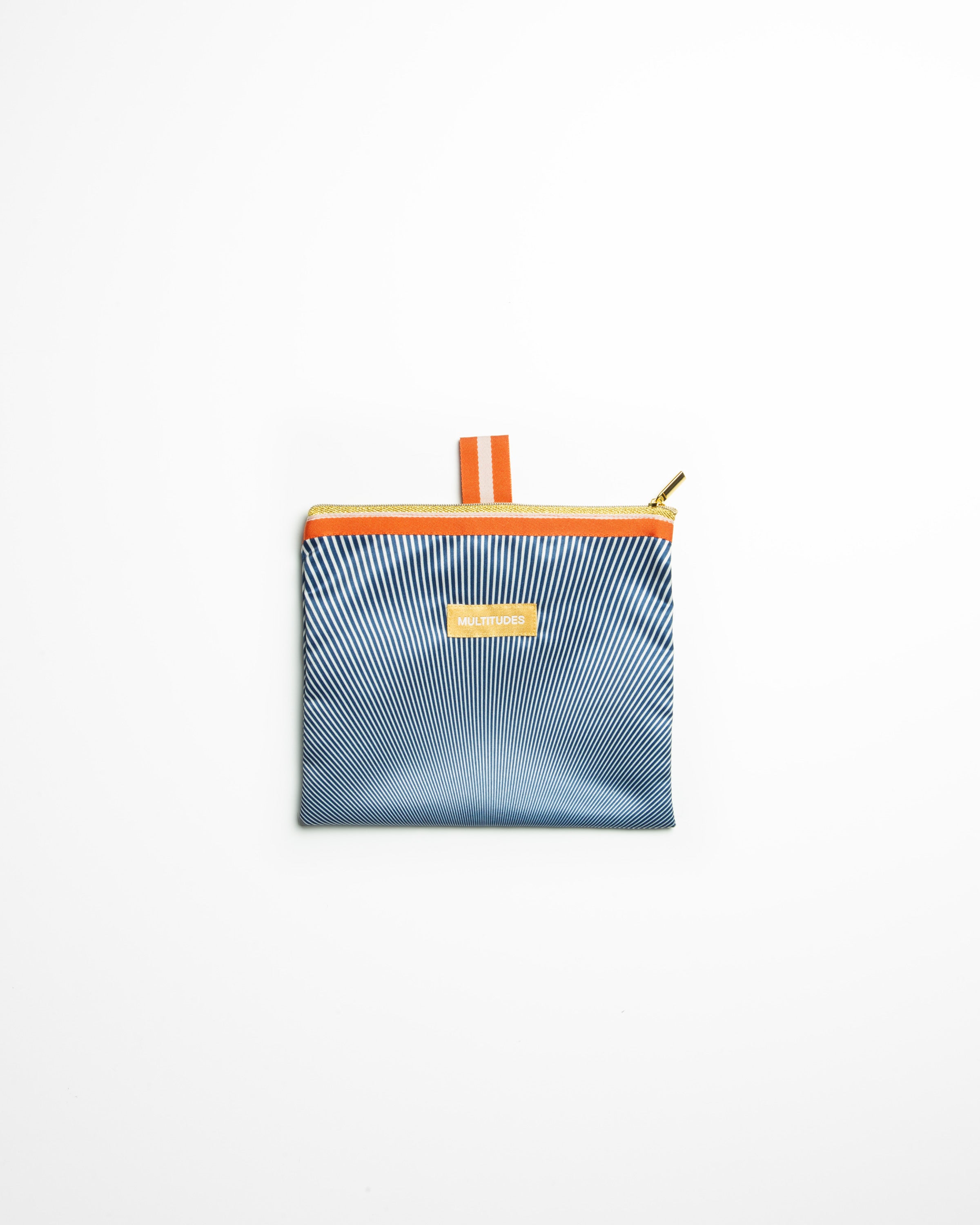 Pochette in tessuto Anna Rust di Multitudes. Ruggine, bianco, blu cobalto, con zip e passante per gancio.